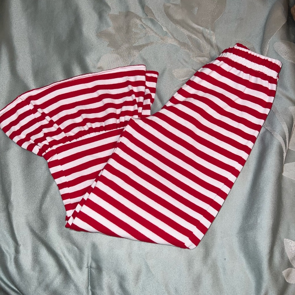 Classic whimsy red and white holiday striped pants with flare bottoms size 6 EUC